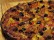 Photo of Pizza with veg Italian sausage, mango and olives